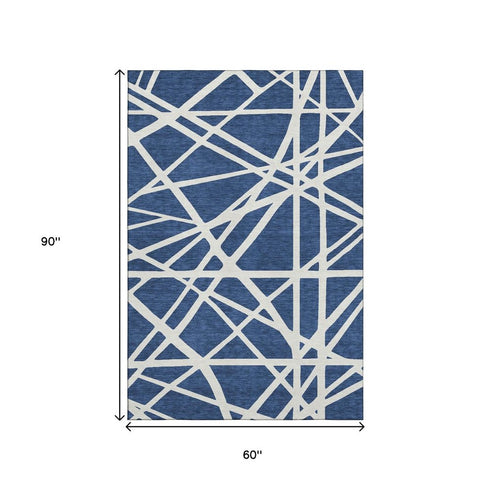 5' X 8' Navy Blue And Ivory Geometric Washable Area Rug With UV Protection