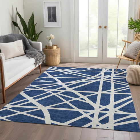 9' X 12' Navy Blue And Ivory Geometric Washable Area Rug With UV Protection