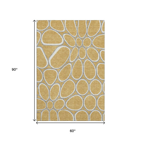 5' X 8' Gold Ivory And Gray Geometric Washable Area Rug With UV Protection