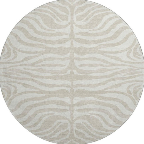 8' Beige And Ivory Animal Print Washable Round Rug With UV Protection