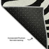 5' X 8' Black And Ivory Animal Print Washable Area Rug With UV Protection