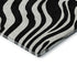 5' X 8' Black And Ivory Animal Print Washable Area Rug With UV Protection