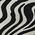 5' X 8' Black And Ivory Animal Print Washable Area Rug With UV Protection