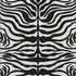 5' X 8' Black And Ivory Animal Print Washable Area Rug With UV Protection