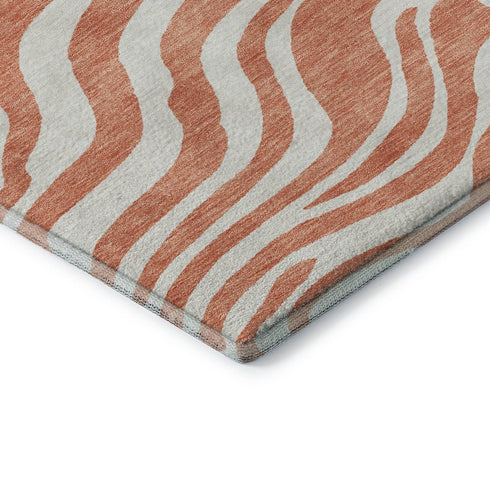 5' X 8' Coral And Ivory Animal Print Washable Area Rug With UV Protection