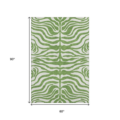 5' X 8' Green And Ivory Animal Print Washable Area Rug With UV Protection