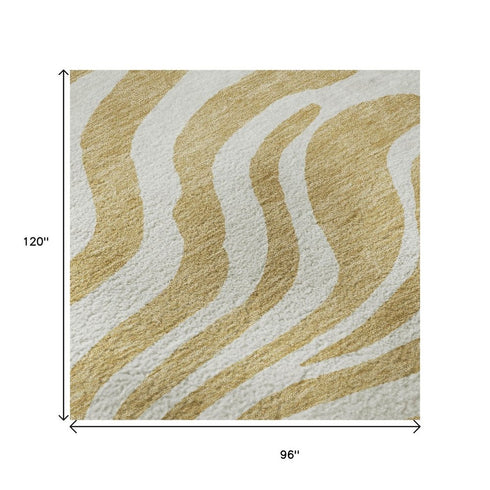 8' X 10' Gold And Ivory Animal Print Washable Area Rug With UV Protection