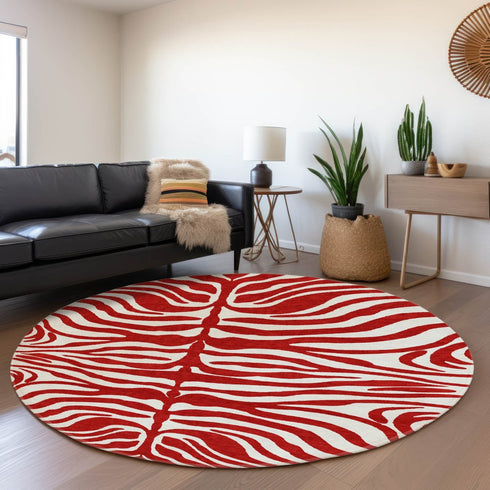 8' Red And Ivory Animal Print Washable Round Rug With UV Protection