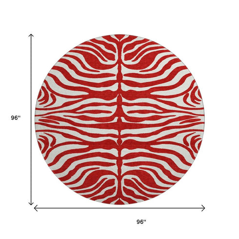 8' Red And Ivory Animal Print Washable Round Rug With UV Protection