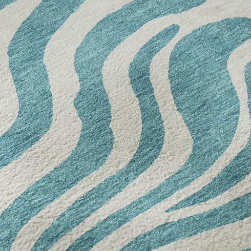 8' X 10' Teal And Ivory Animal Print Washable Area Rug With UV Protection