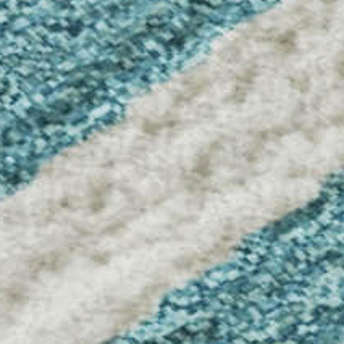 8' X 10' Teal And Ivory Animal Print Washable Area Rug With UV Protection