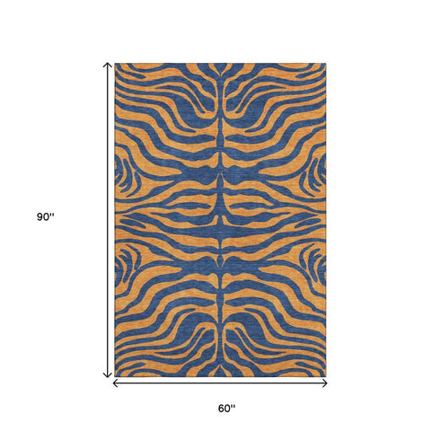 5' X 8' Navy Blue And Orange Animal Print Washable Area Rug With UV Protection