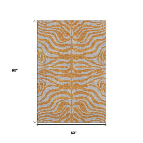 5' X 8' Orange And Gray Animal Print Washable Area Rug With UV Protection