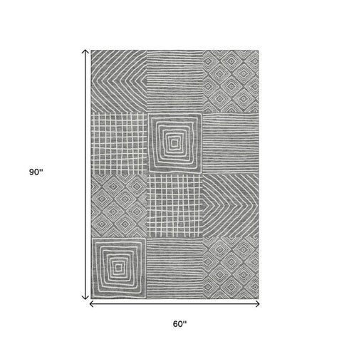 5' X 8' Charcoal And Ivory Geometric Washable Area Rug With UV Protection