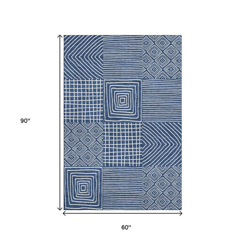 5' X 8' Navy Blue And Ivory Geometric Washable Area Rug With UV Protection