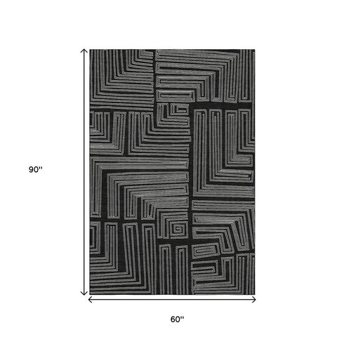 5' X 8' Black And Ivory Geometric Washable Area Rug With UV Protection
