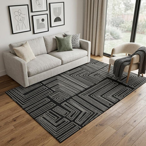 5' X 8' Black And Ivory Geometric Washable Area Rug With UV Protection