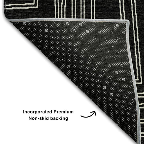 5' X 8' Black And Ivory Geometric Washable Area Rug With UV Protection