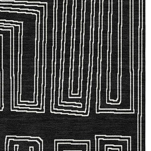 5' X 8' Black And Ivory Geometric Washable Area Rug With UV Protection