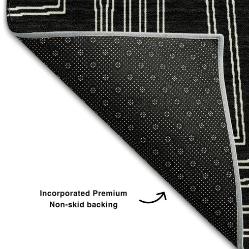 8' X 10' Black And Ivory Geometric Washable Area Rug With UV Protection