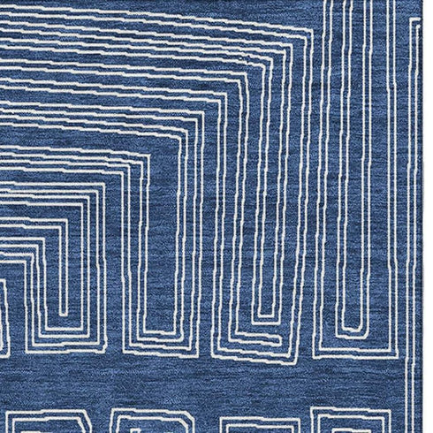 5' X 8' Navy Blue And Ivory Geometric Washable Area Rug With UV Protection