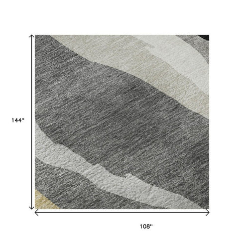 9' X 12' Black Gold And Ivory Abstract Washable Area Rug With UV Protection