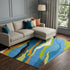 8' X 10' Denim Blue Orange And Lime Green Abstract Washable Area Rug With UV Protection