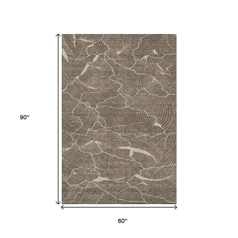 5' X 8' Brown Beige And Ivory Abstract Washable Area Rug With UV Protection