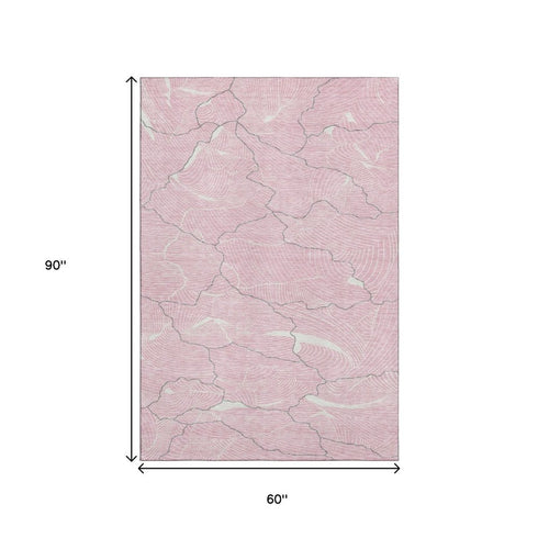 5' X 8' Pink Gray And Ivory Abstract Washable Area Rug With UV Protection