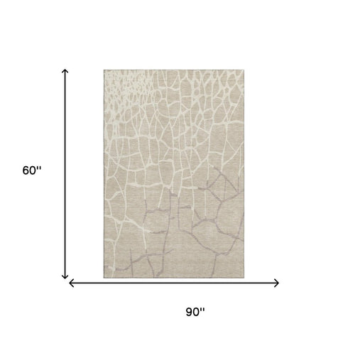 5' X 8' Beige Ivory And Taupe Abstract Geometric Washable Area Rug With UV Protection