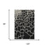 8' X 10' Black And Ivory Abstract Geometric Washable Area Rug With UV Protection