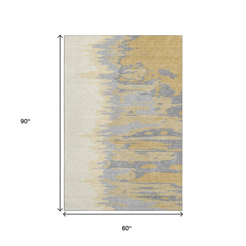 5' X 8' Gold Ivory And Gray Abstract Washable Area Rug With UV Protection
