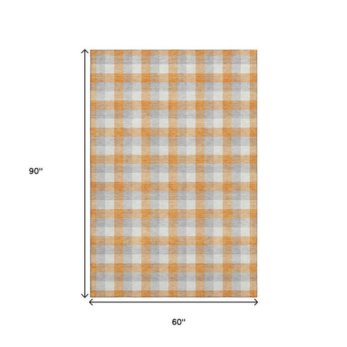5' X 8' Orange Ivory And Gray Plaid Washable Area Rug With UV Protection