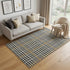 5' X 8' Black Ivory And Gold Plaid Washable Area Rug With UV Protection