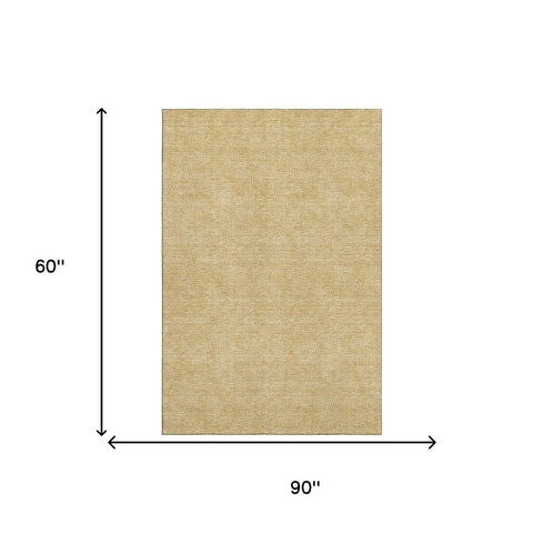 5' X 8' Gold And Ivory Geometric Washable Area Rug With UV Protection