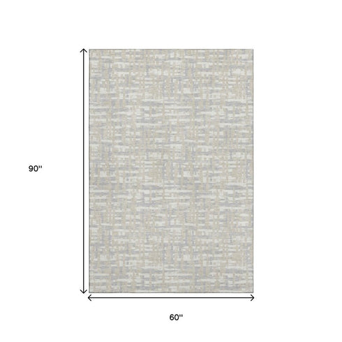 5' X 8' Beige Ivory And Silver Abstract Geometric Washable Area Rug With UV Protection