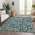 8' X 10' Navy Blue Ivory And Green Abstract Geometric Washable Area Rug With UV Protection