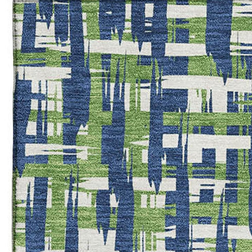 8' X 10' Navy Blue Ivory And Green Abstract Geometric Washable Area Rug With UV Protection