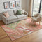 5' X 8' Coral Green And Peach Abstract Washable Area Rug With UV Protection