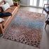 8' X 10' Rust Teal And Ivory Polka Dot Washable Area Rug With UV Protection