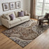 5' X 8' Brown Beige And Taupe Paisley Washable Area Rug With UV Protection