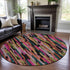 8' Pink Teal And Orange Striped Washable Round Rug With UV Protection