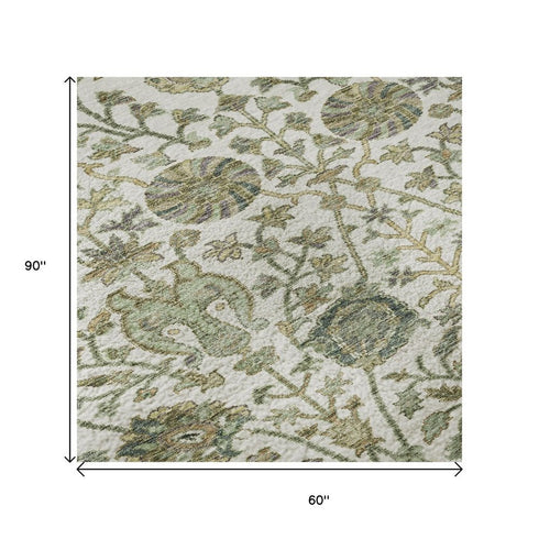5' X 8' Ivory Fern Green And Beige Floral Washable Area Rug With UV Protection