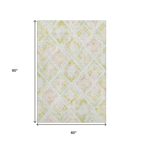 5' X 8' Pink Lime Green And Ivory Geometric Washable Area Rug With UV Protection