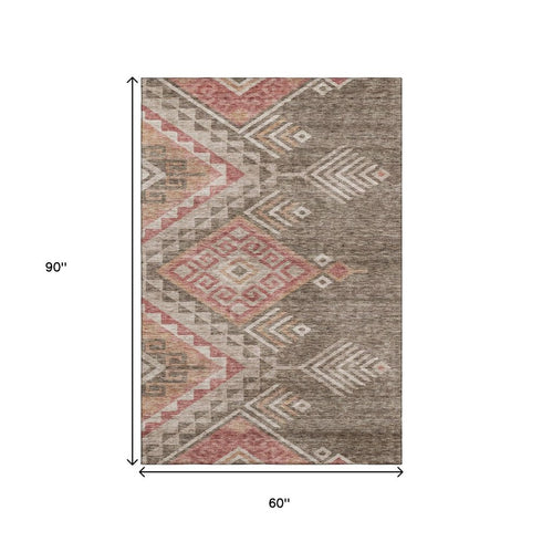 5' X 8' Brown Salmon And Ivory Geometric Washable Area Rug With UV Protection