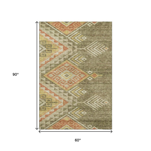 5' X 8' Green Gold And Salmon Geometric Washable Area Rug With UV Protection