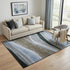 5' X 8' Brown Blue And Silver Abstract Washable Area Rug With UV Protection