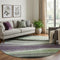8' Purple Green And Ivory Abstract Washable Round Rug With UV Protection