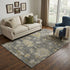 5' X 8' Gray Gold And Beige Floral Washable Area Rug With UV Protection
