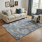 5' X 8' Blue Ivory And Taupe Abstract Geometric Washable Area Rug With UV Protection